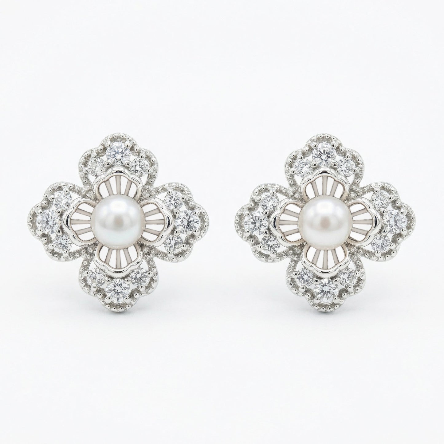 925 Sterling Silver Elegant Floral Pearl and Sparkling Accent Stud Earrings in White Metal