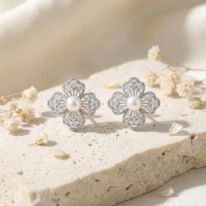 925 Sterling Silver Elegant Floral Pearl and Sparkling Accent Stud Earrings in White Metal